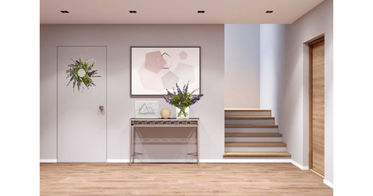 Minimalist living room in neutral colors with lavender plant on wall table