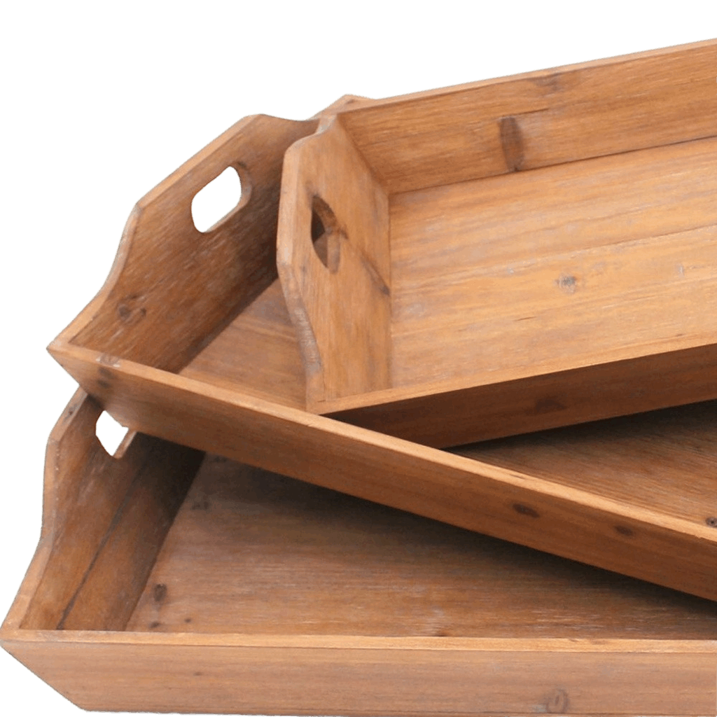 closeup of country style wooden trays in three sizes highlighting handles